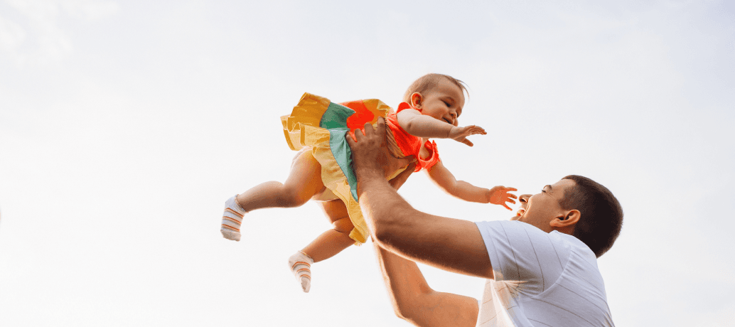 Image of Father and Daughter Playing